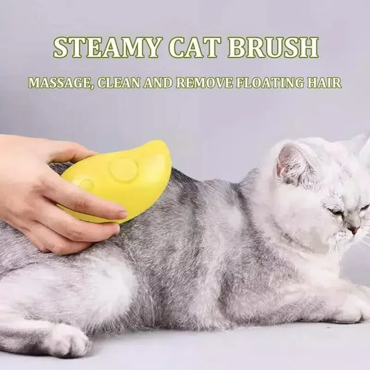 Steam grooming brush spraying mist while brushing